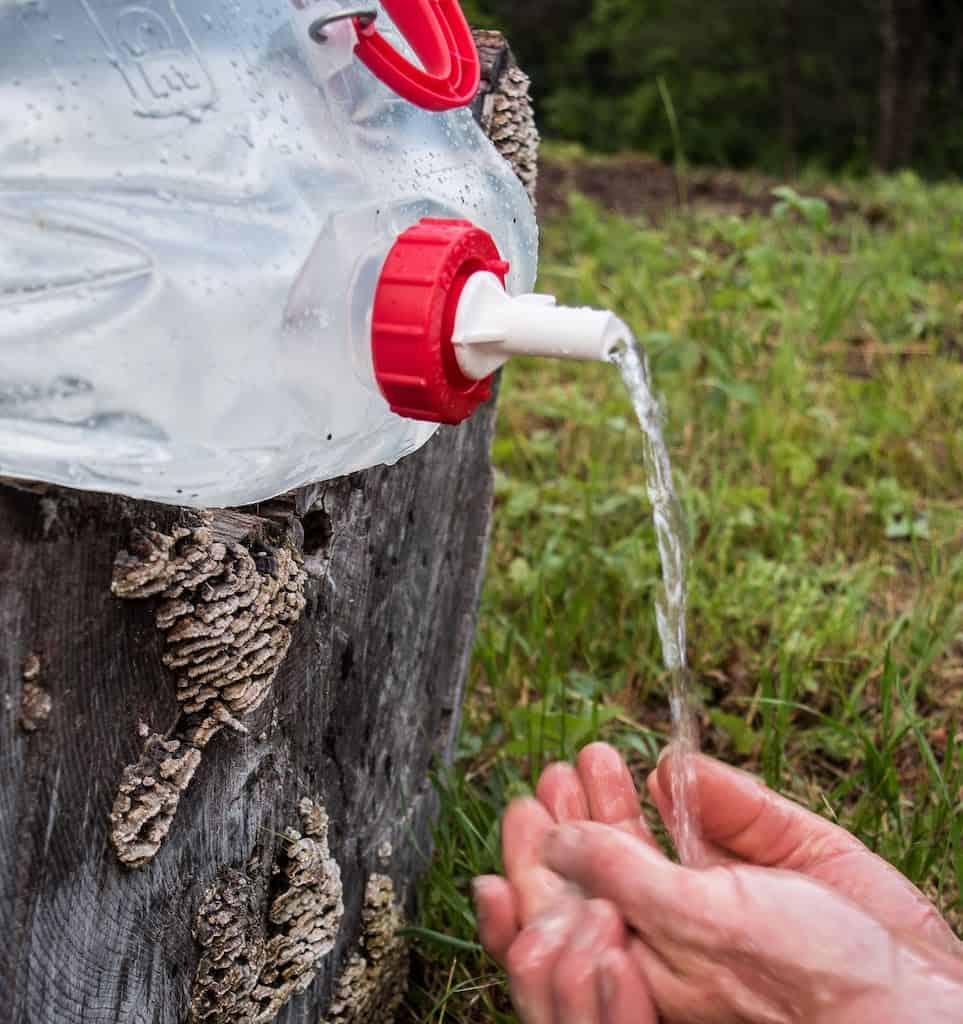 A portable water jug for camping. 