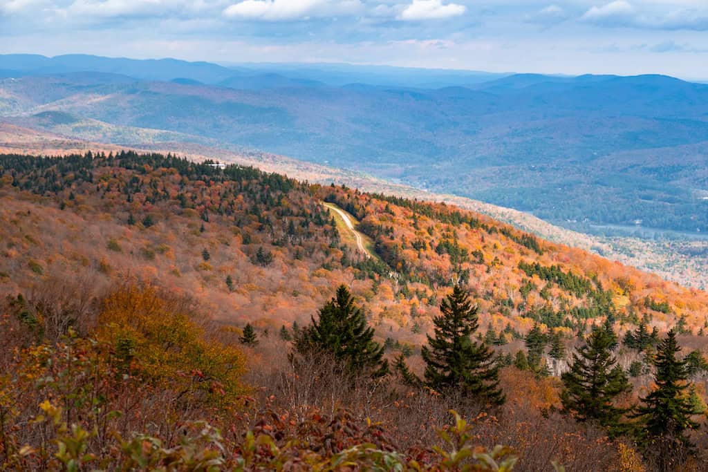 Plan a Gorgeous Route 100 Vermont Road Trip (Complete Itinerary for 2025) 10 Fall foliage views from the top of Okemo Mountain.