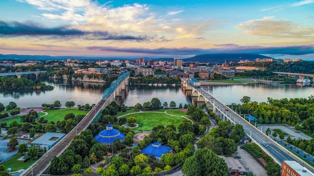 7 Affordable Spring Break Destinations for 2026 8 An aerial view of Chattanooga, Tennessee, during the spring.