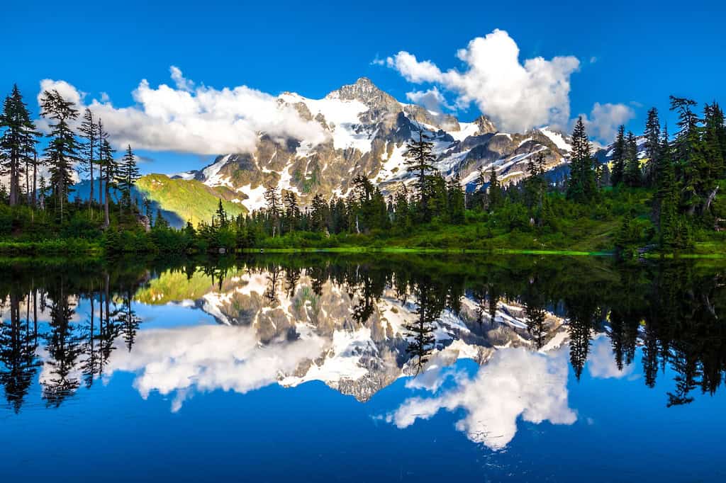 National Forest Week 2025: A Celebration of Where We Come Alive 2 he classic alpine vista of Mt. Shuksan mirrored in Picture Lake is one of the most photographed mountain scenes in North America. Photo credit: US Forest Service
