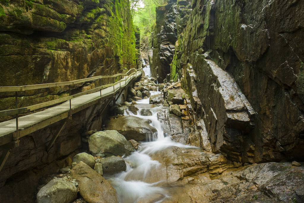 25+ Incredible Things to Do in the White Mountains of New Hampshire 3 A boardwalk through the Flume Gorge in Franconia Notch State Park.