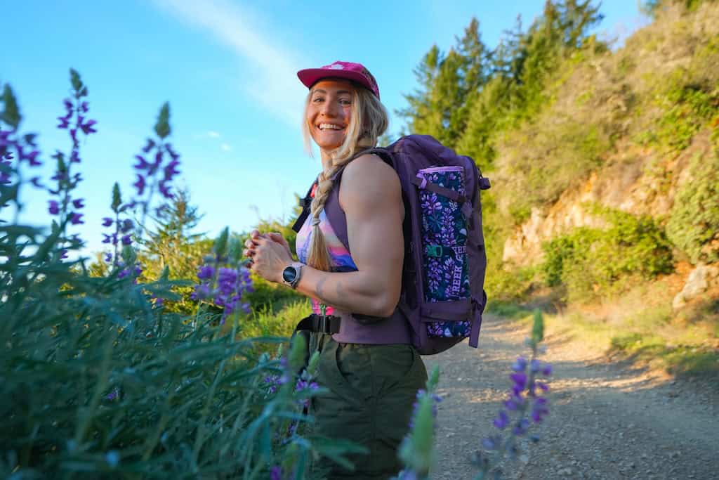 This Might Be the Prettiest Camp Chair You’ll Ever Own 2 Rachel Pohl wearing a backpack with her new Crazy Creek Chair attached.